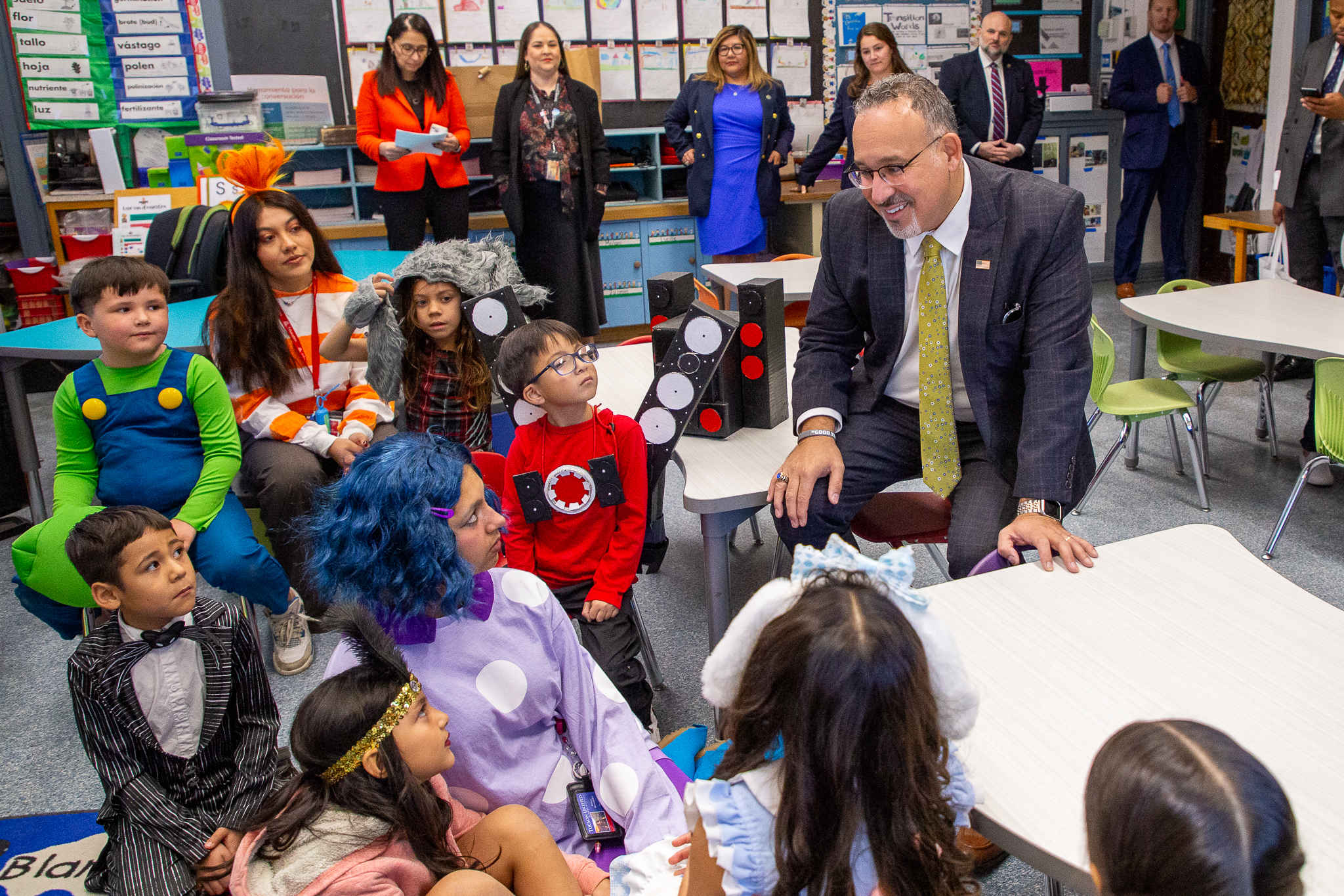 Secretary Cardona talks to students in a classroom